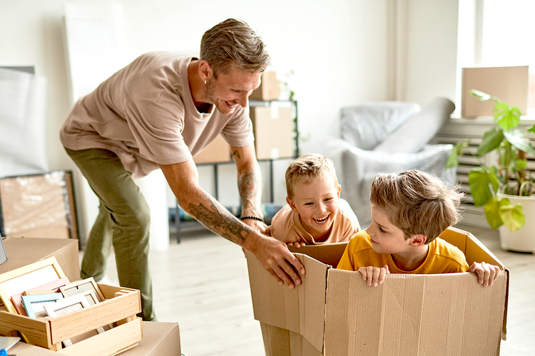 man playng with two kids