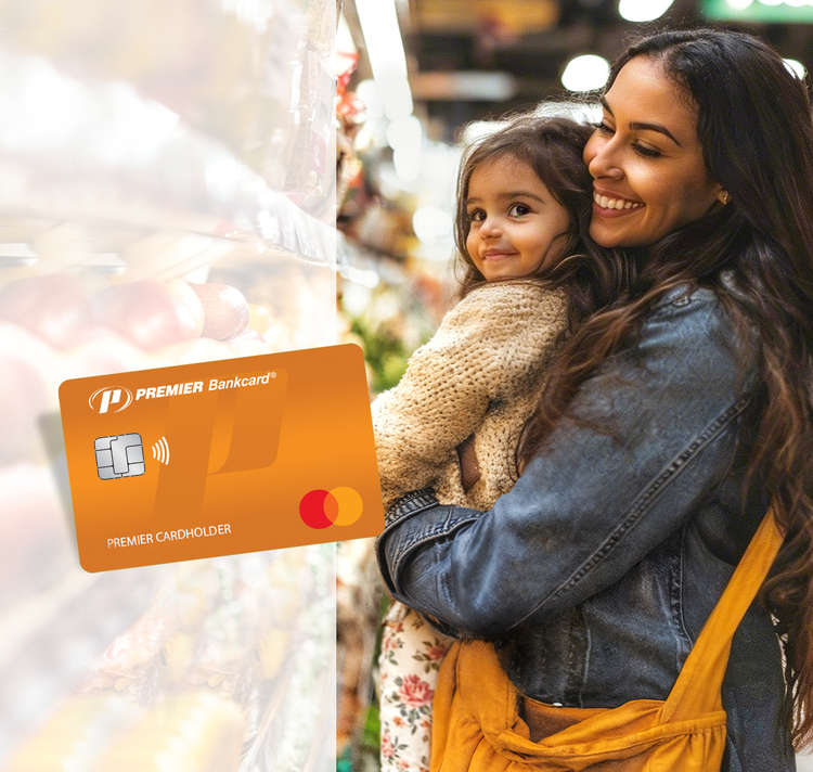 a woman holding her daughter in the grocery store
